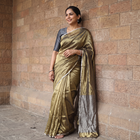 Brown Traditional Handloom Tissue Zari Chanderi Silk Saree, draped and worn by a woman, AI visual of the saree, iTokri