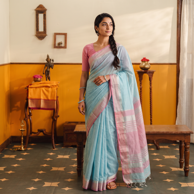 Blue Traditional Handloom Zari Work Silk Maheshwari Saree, draped and worn by a woman, AI visual of the saree, iTokri