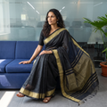 Black Traditional Handloom Zari Work Silk Maheshwari Saree, draped and worn by a woman, AI visual of the saree, iTokri