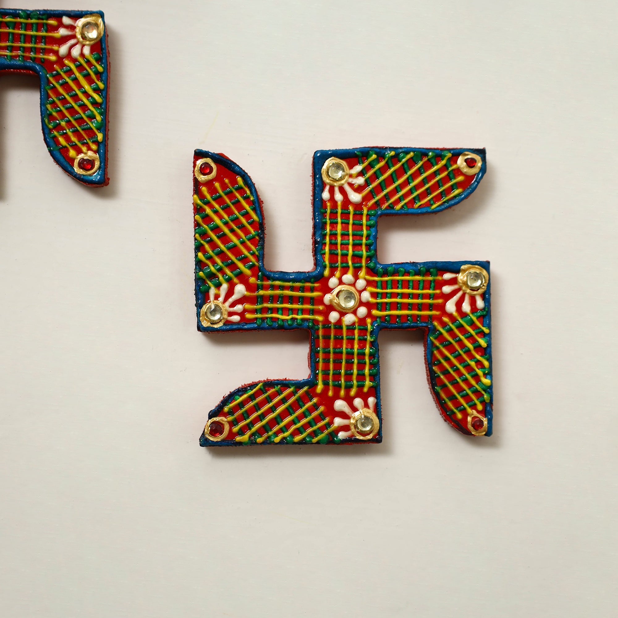 Traditional handpainted wooden swastik (pair) 24