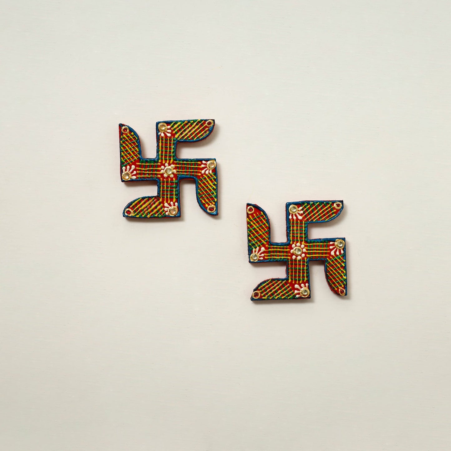 Traditional handpainted wooden swastik (pair) 24