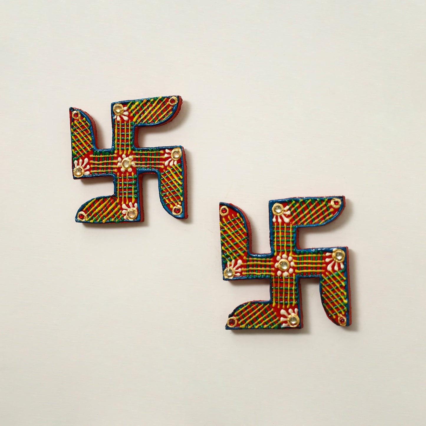 Traditional handpainted wooden swastik (pair) 24