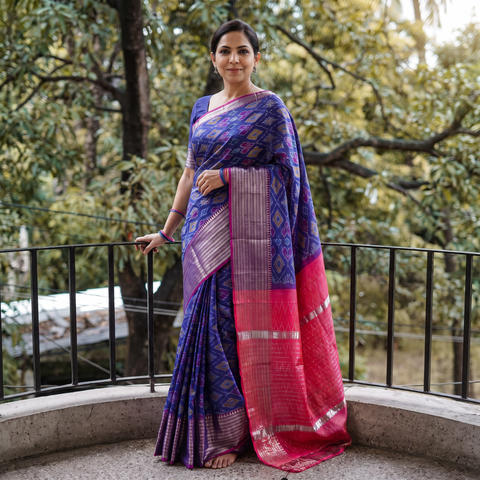 Blue Traditional Pochampally Ikat Handwoven Pure Silk Pattu Saree with Rudraksha Border, draped and worn by a woman, AI visual of the saree, iTokri