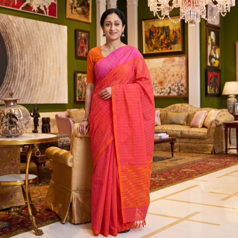 Red Traditional Venkatagiri Handloom Cotton Checks Saree, draped and worn by a woman, AI visual of the saree, iTokri