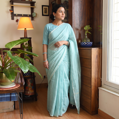 Green Traditional Venkatagiri Handloom Cotton Zari Saree, draped and worn by a woman, AI visual of the saree, iTokri