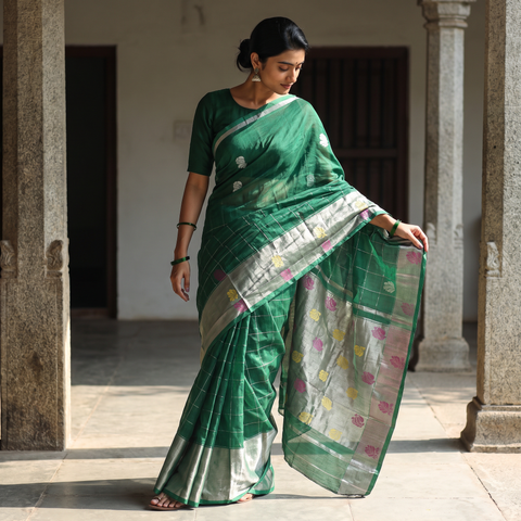Green Traditional Venkatagiri Pure Handloom Silk Cotton Zari Weave Saree, draped and worn by a woman, AI visual of the saree, iTokri