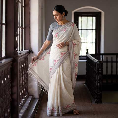 Beige Trangle Pattern with Red Buti Extra Weft Handloom Cotton Saree, draped and worn by a woman, AI visual of the saree, iTokri