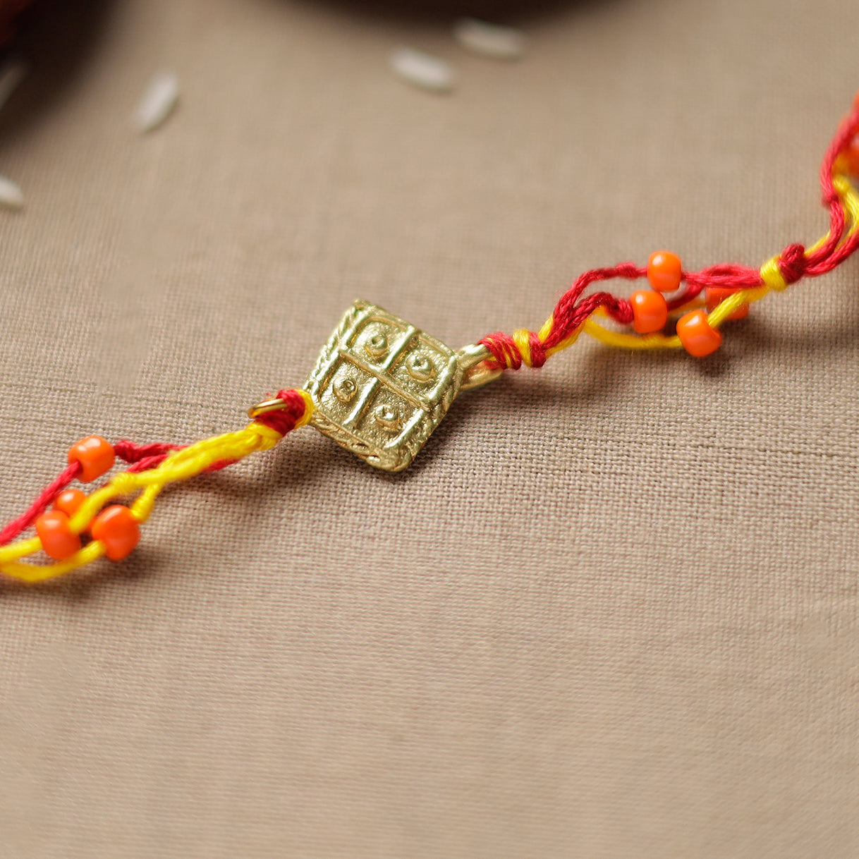  Tribal Dokra Craft Reusable Brass Rakhi by Miharu 14 