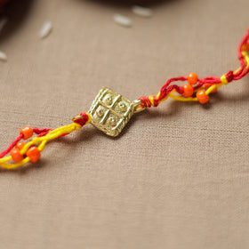 Tribal Dokra Craft Reusable Brass Rakhi by Miharu 14 