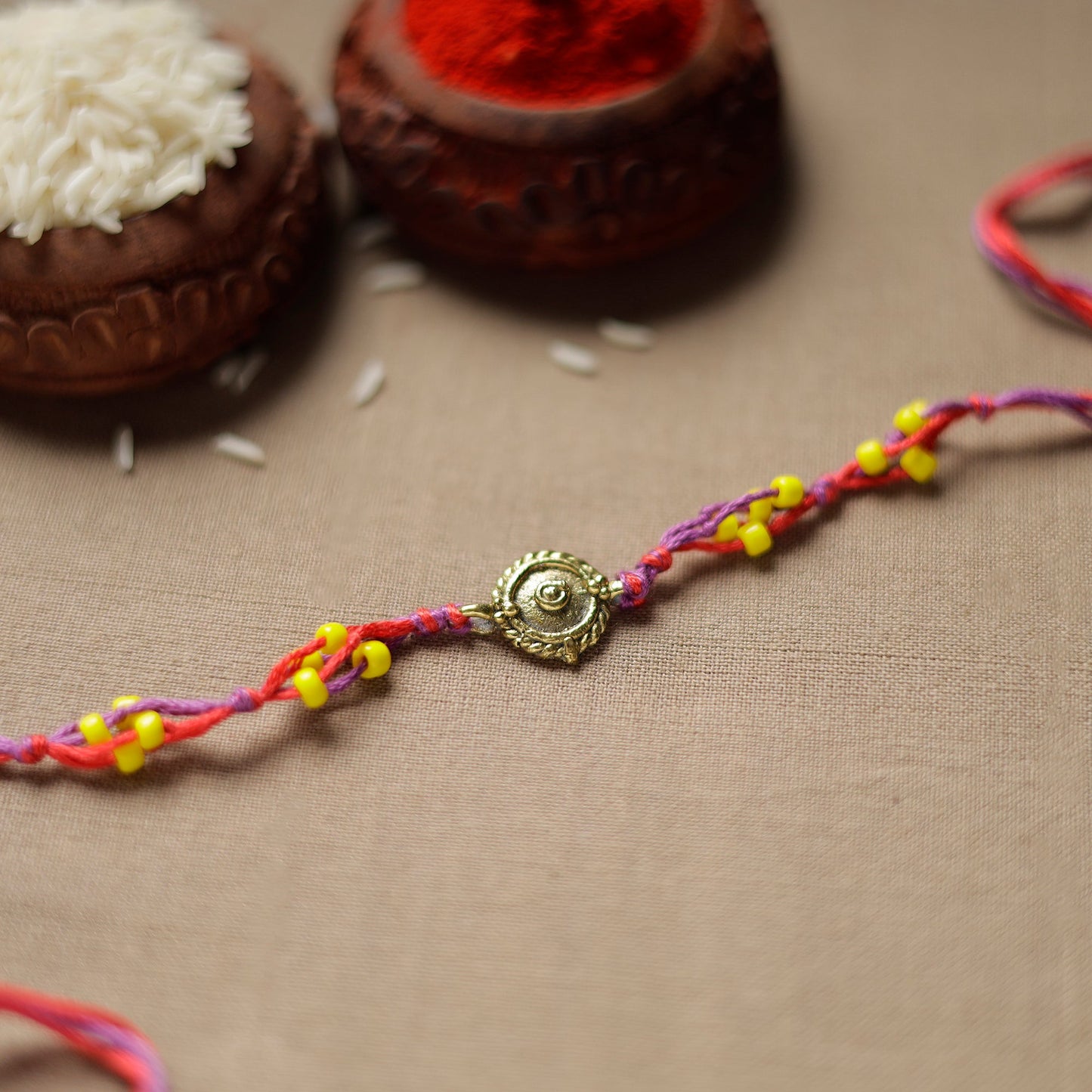  Tribal Dokra Craft Reusable Brass Rakhi by Miharu 16 