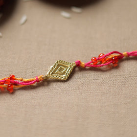  Tribal Dokra Craft Reusable Brass Rakhi by Miharu 20 