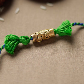  Tribal Dokra Craft Reusable Brass Rakhi by Miharu 21 