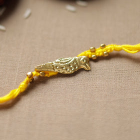  Tribal Dokra Craft Reusable Brass Rakhi by Miharu 24 