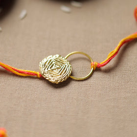  Tribal Dokra Craft Reusable Brass Rakhi by Miharu 26 