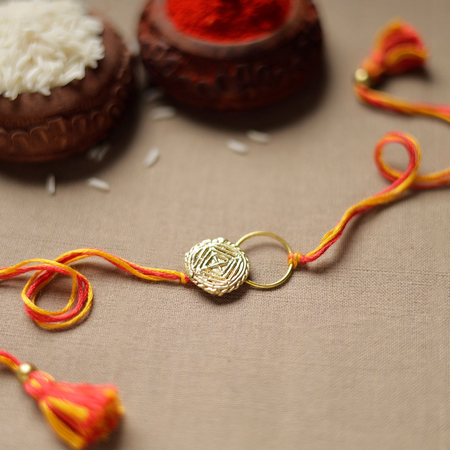  Tribal Dokra Craft Reusable Brass Rakhi by Miharu 26 