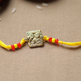 Tribal Dokra Craft Brass Rakhi by Miharu 29 