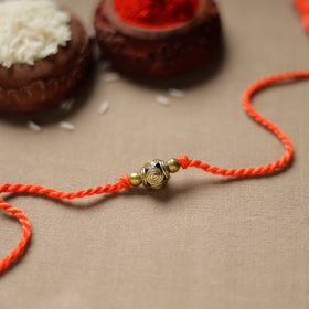  Tribal Dokra Craft Brass Rakhi by Miharu 30 