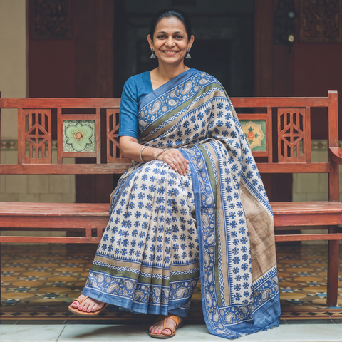 Blue Tussar Silk Pure Handloom Saree in Bengal Hand Block Prints, draped and worn by a woman, AI visual of the saree, iTokri