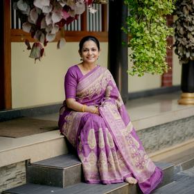 Purple Tussar Silk Pure Handloom Saree in Bengal Hand Block Prints, draped and worn by a woman, AI visual of the saree, iTokri