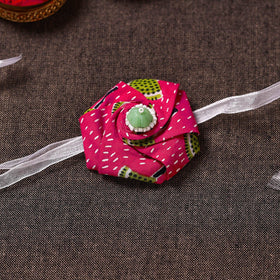 Twisted Rose - Handmade Blue Mango Rakhi 