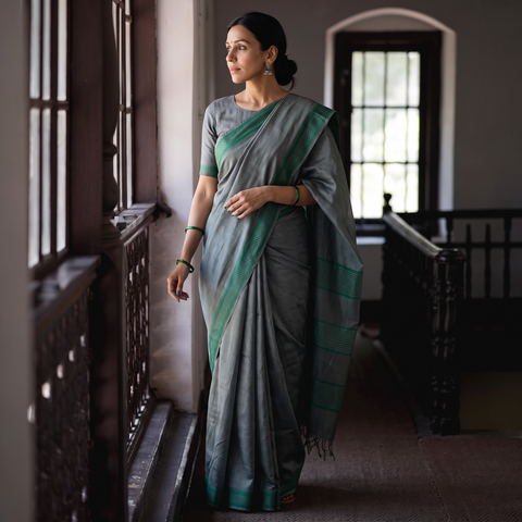 Grey Vidarbha Bamboo Tussar Cotton Dobby Border Handloom Saree, draped and worn by a woman, AI visual of the saree, iTokri