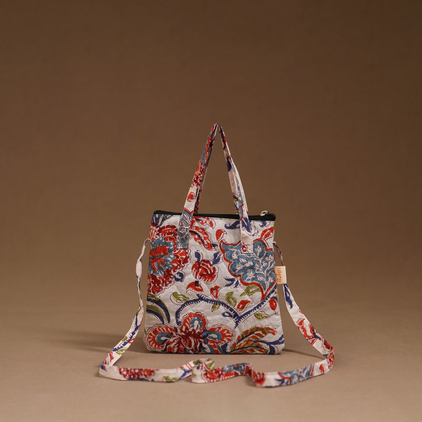 Handcrafted quilted sling bag 11