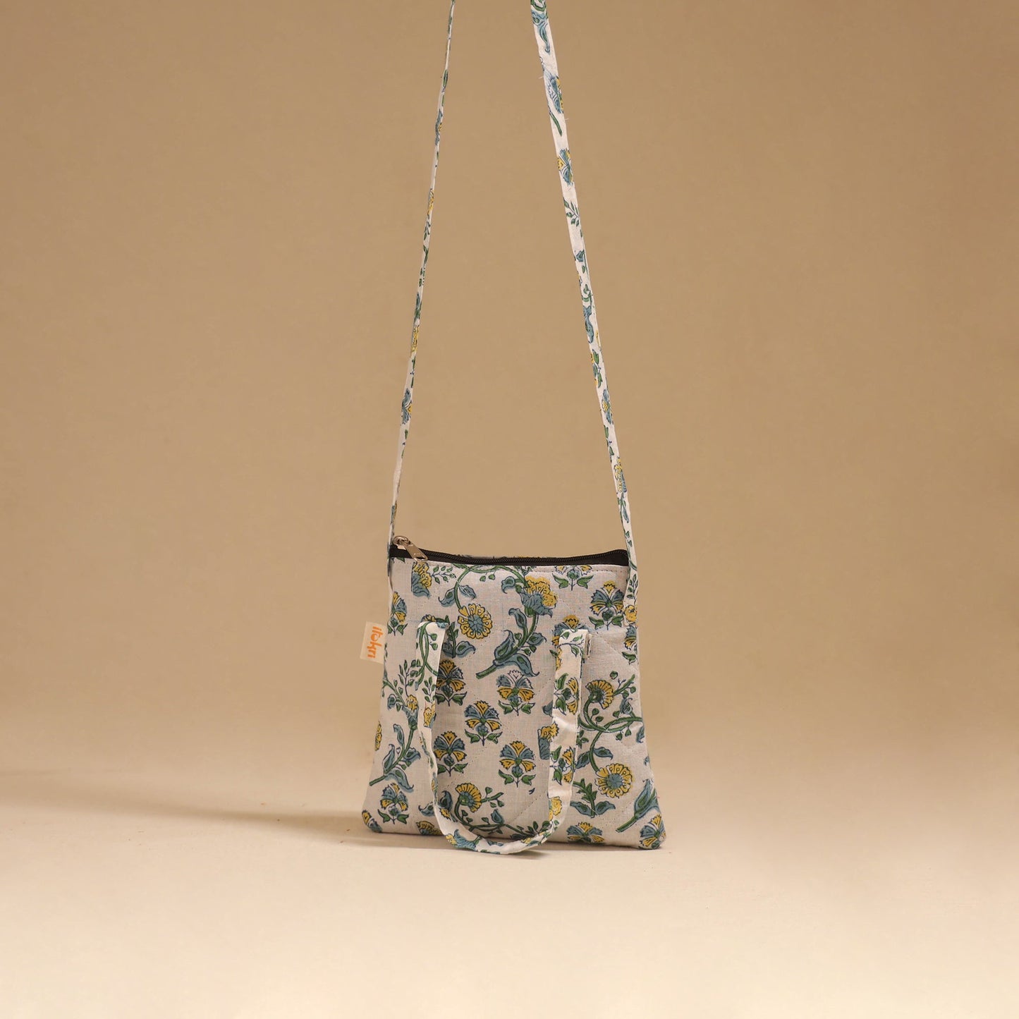 Handcrafted quilted sling bag 11