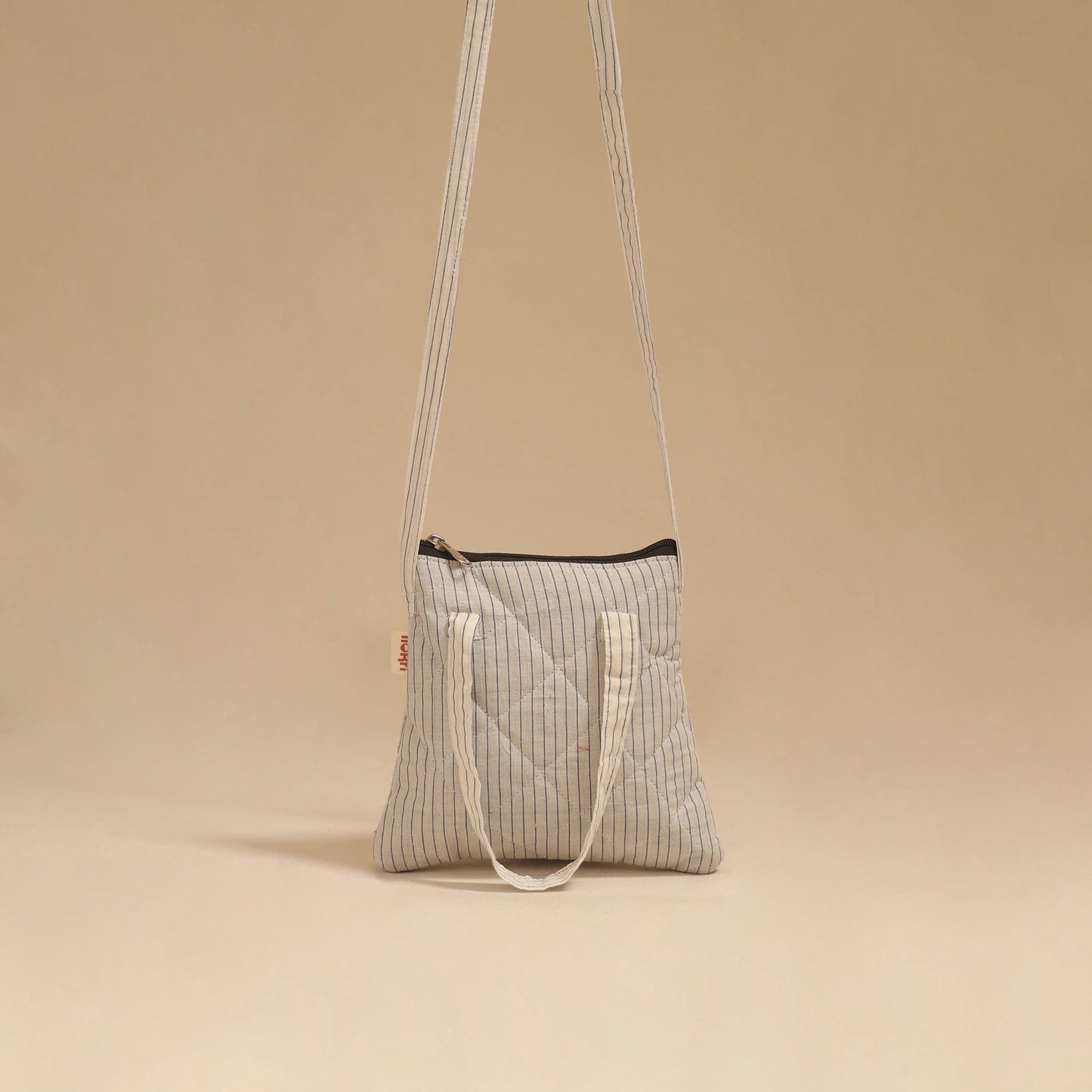 Handcrafted quilted sling bag 47