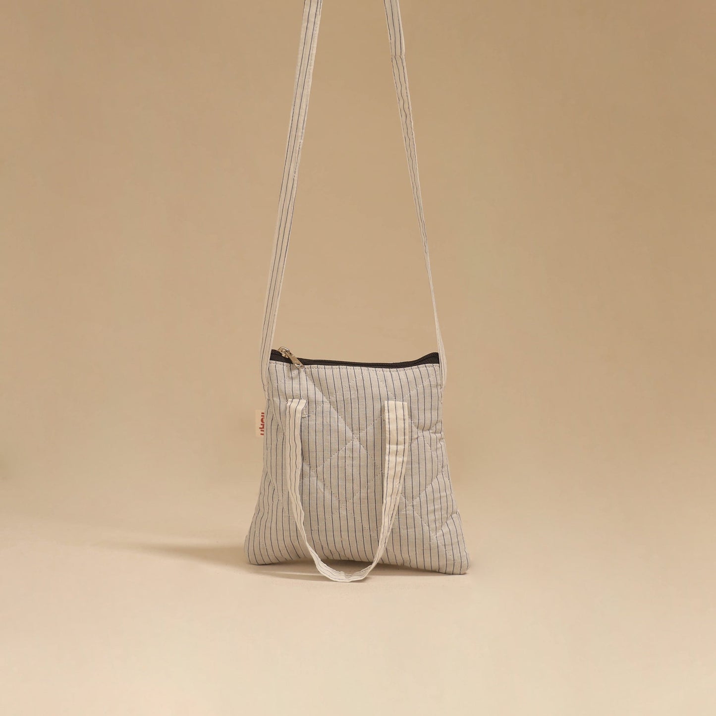 Handcrafted quilted sling bag 47