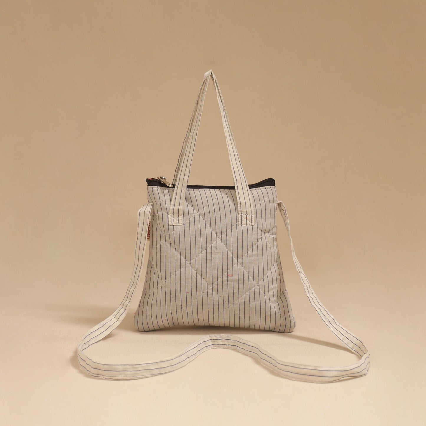 Handcrafted quilted sling bag 47