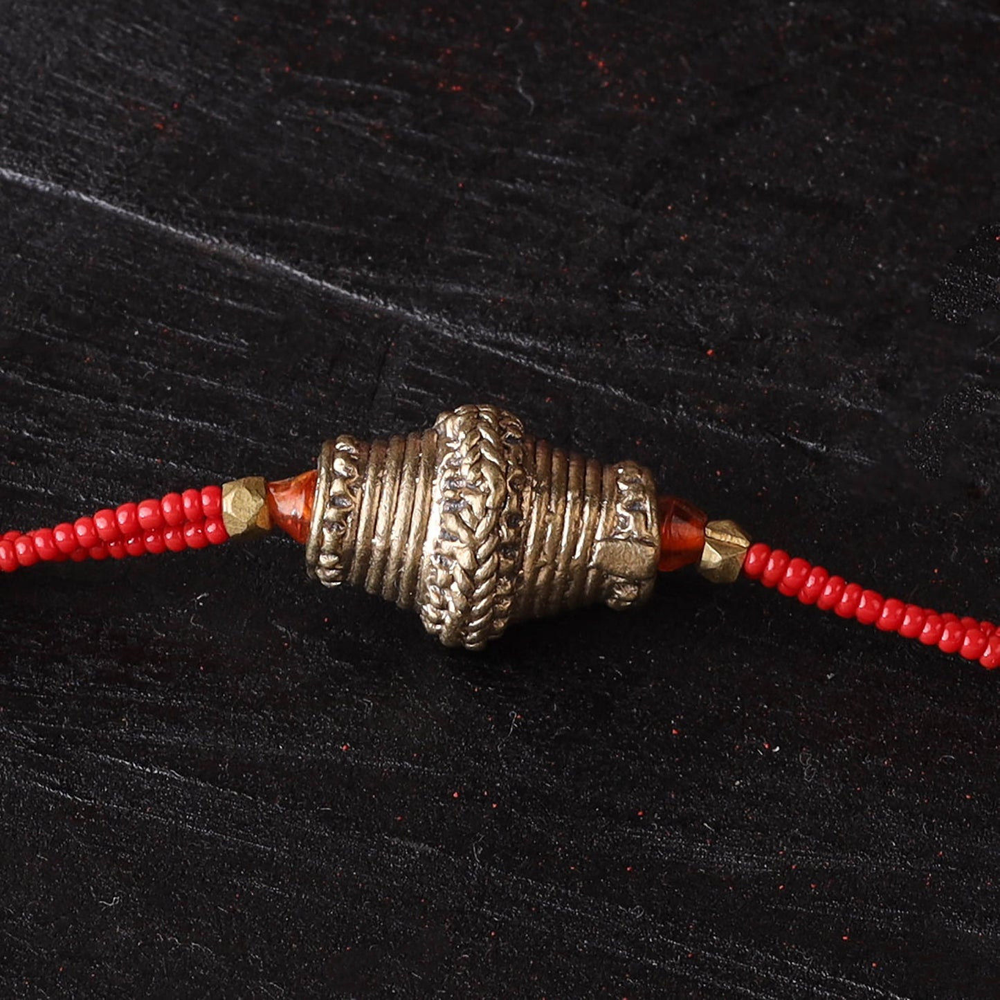 Handcrafted tribal dokra brass thread rakhi 27
