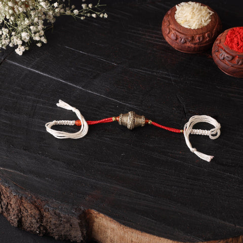Handcrafted tribal dokra brass thread rakhi 27
