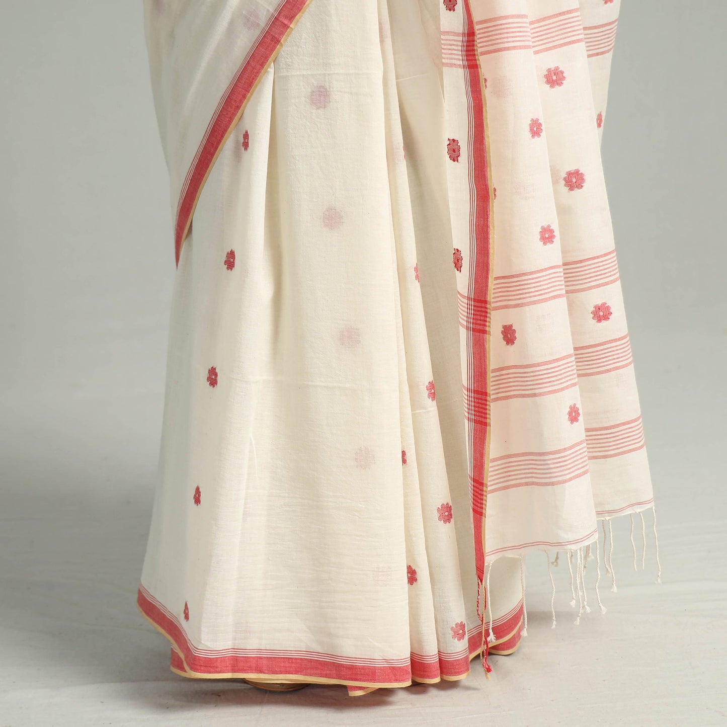 White - handloom cotton phulia jamdani saree with tassels