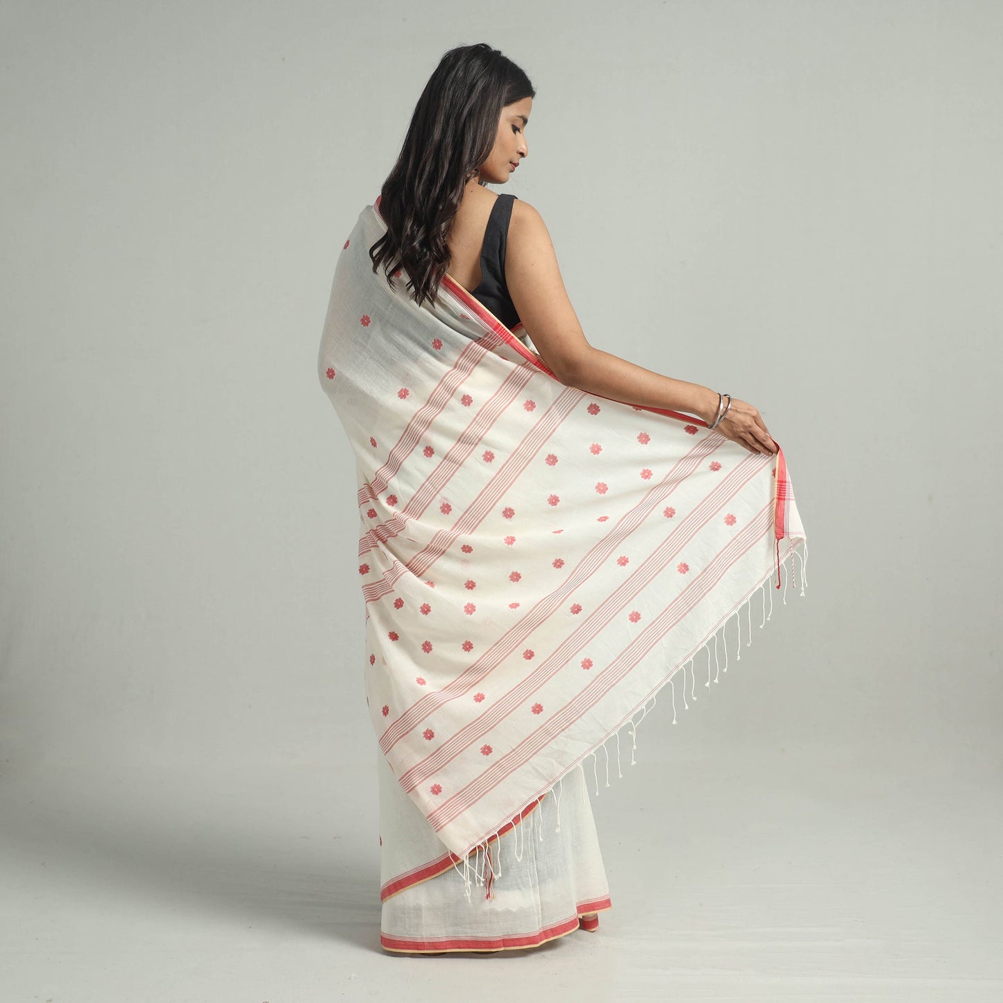 White - handloom cotton phulia jamdani saree with tassels