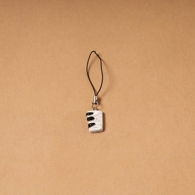 White - quirklets handpainted clay piano bag charm
