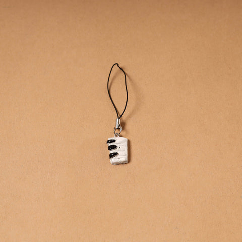White - quirklets handpainted clay piano bag charm