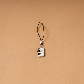 White - quirklets handpainted clay piano bag charm