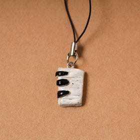 White - quirklets handpainted clay piano bag charm