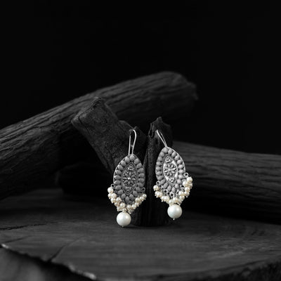 White - saanjh bela oval shape floral oxidised earring