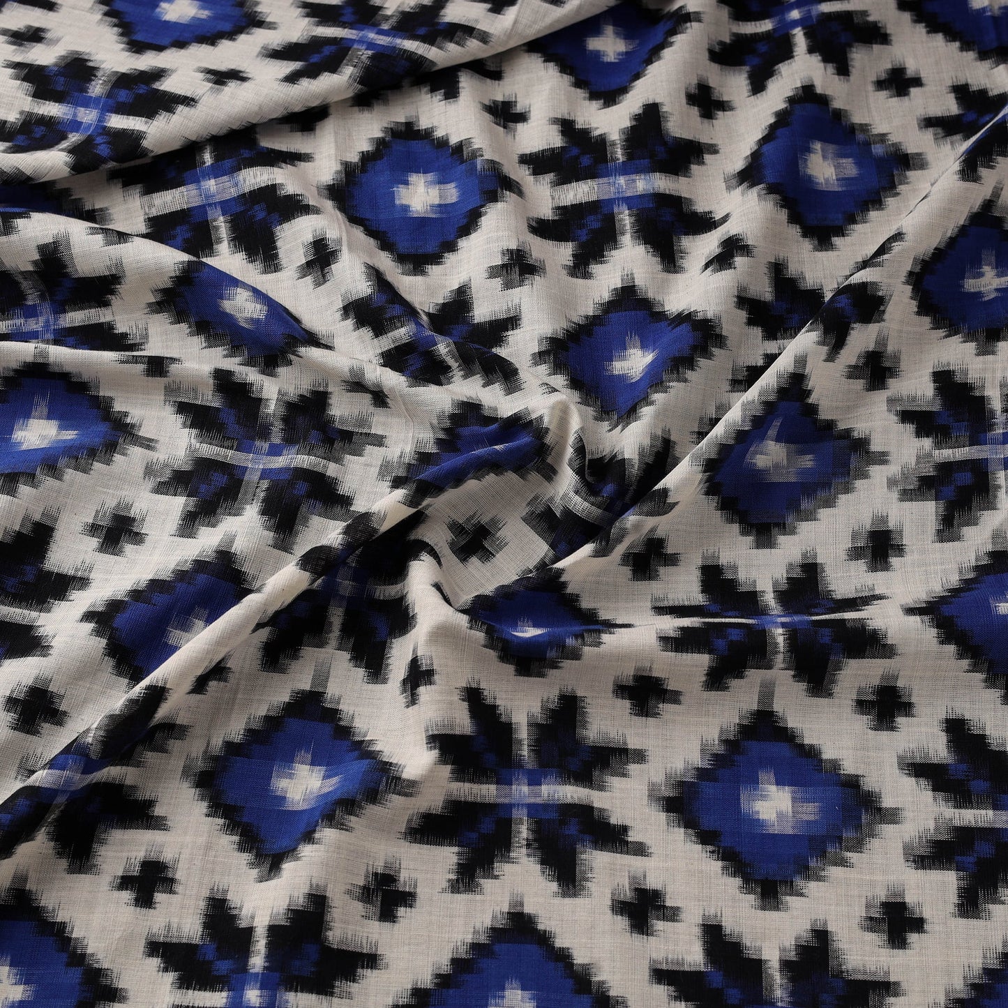 Telia rumal handloom cotton pochampally double ikat fabric