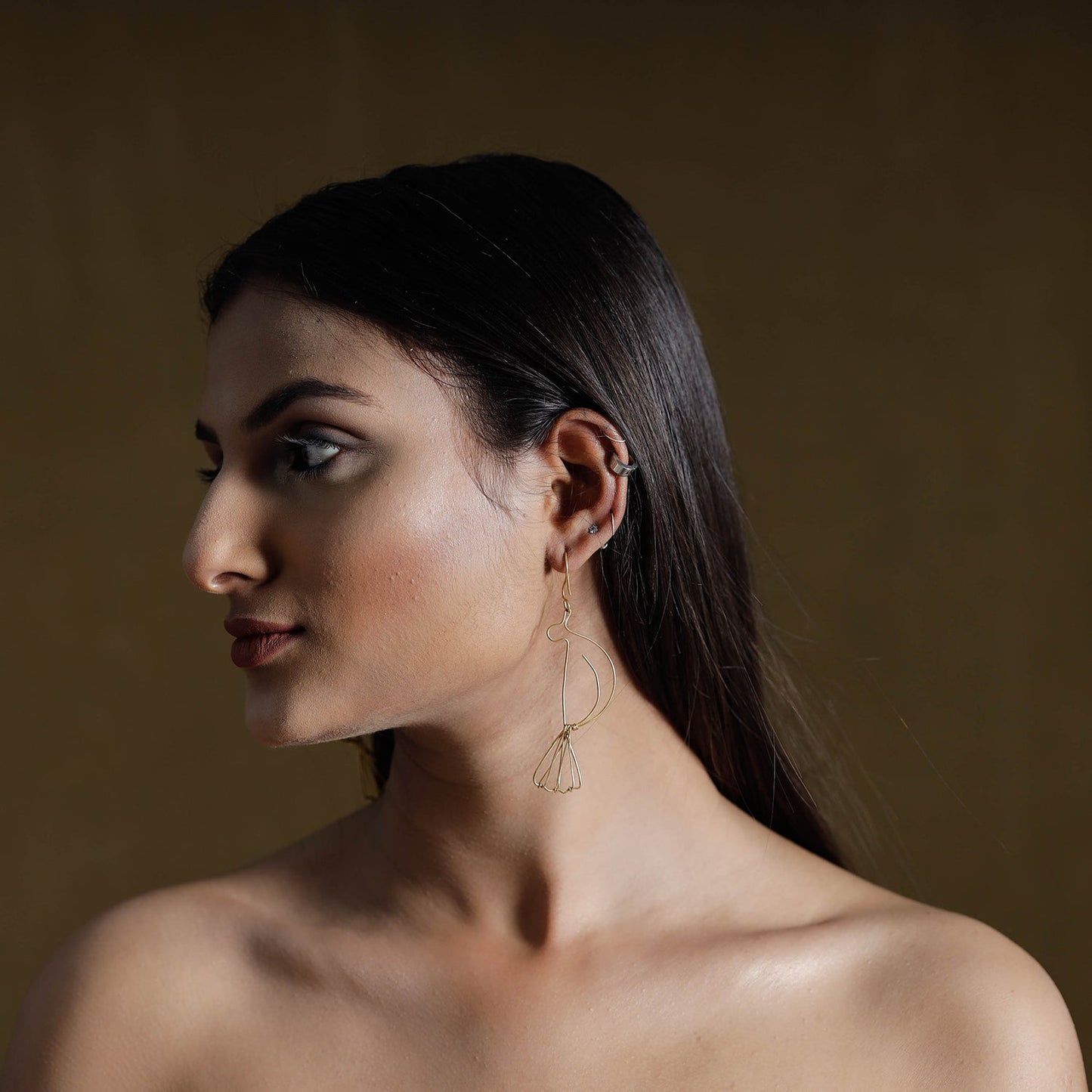 Brass metal handcrafted dokra earrings by asalkaar