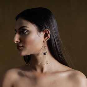 Brass metal handcrafted dokra earrings by asalkaar