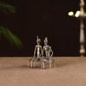 Couple child on cot - tribal odisha dokra handmade home