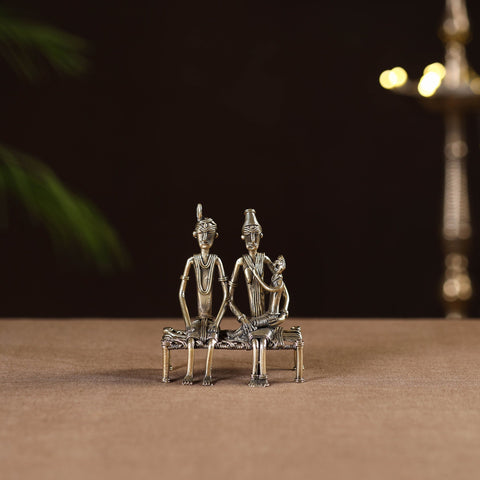 Couple child on cot - tribal odisha dokra handmade home