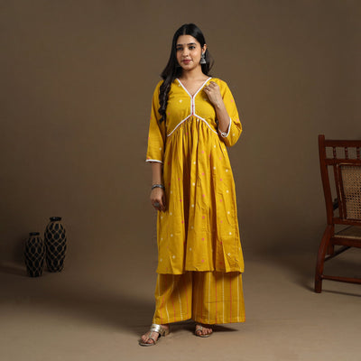 Yellow Flared Cotton Lace Work Jacquard Kurta for Women