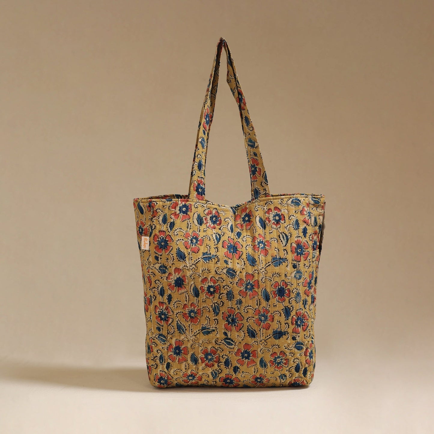 Handcrafted quilted kalamkari block printed fabric tote bag