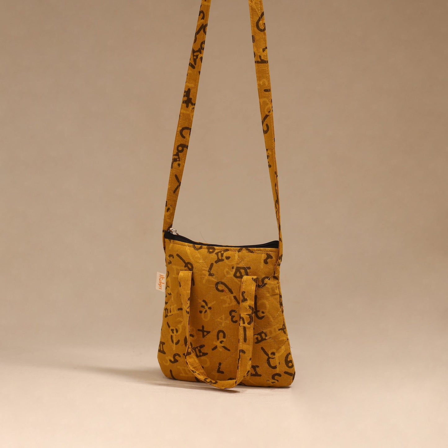 Handcrafted quilted sling bag 32