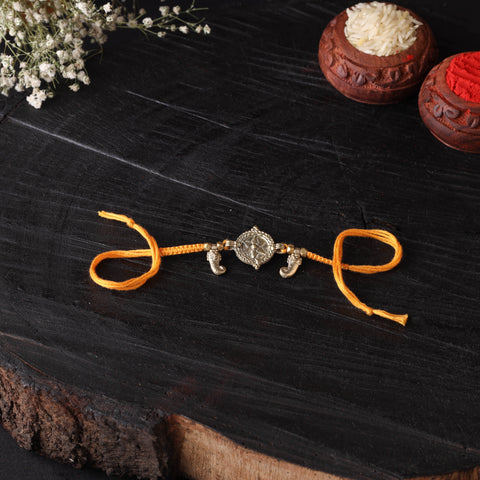 Handcrafted tribal dokra brass thread rakhi 26