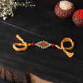 Handcrafted tribal dokra brass thread rakhi 32