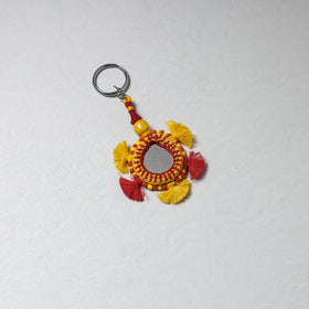 Yellow Handmade Mirror & Threadwork Keychain by Kailash Patwa 